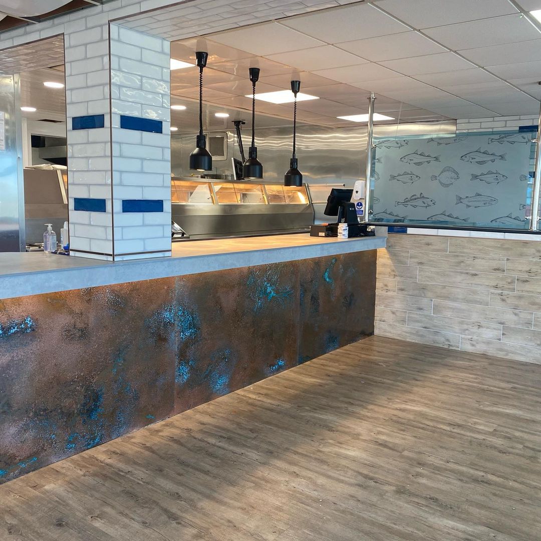 aged copper counters in fish and chip shop
