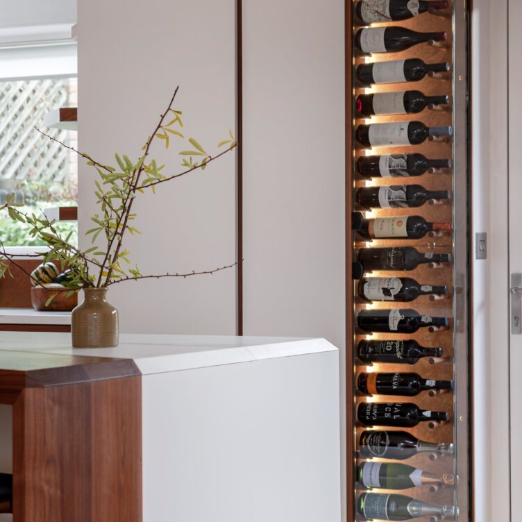 decorative rustic copper sheet behind modern wine wall